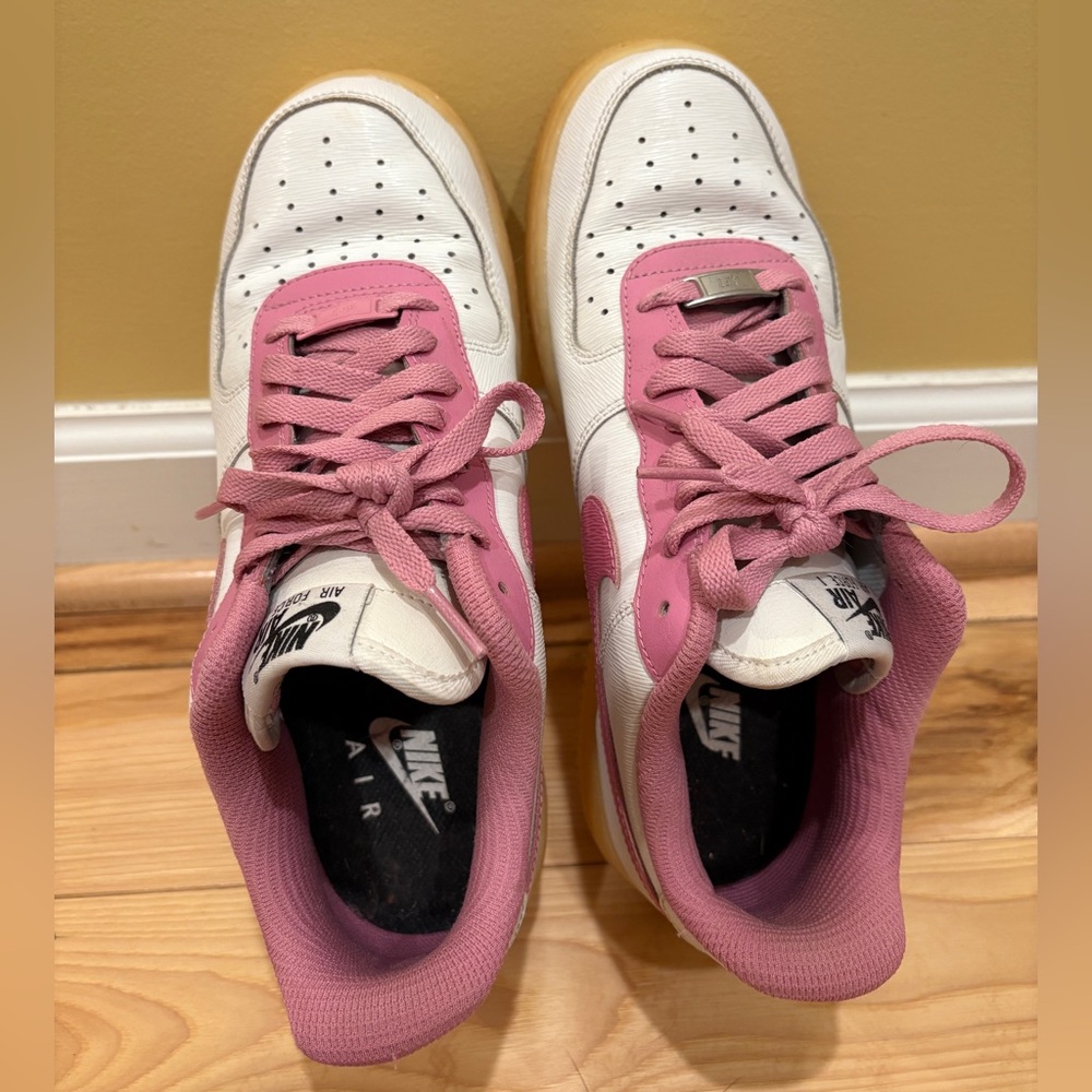 Custom Pink and white Nike Air Force 1 trainers, lightly creased